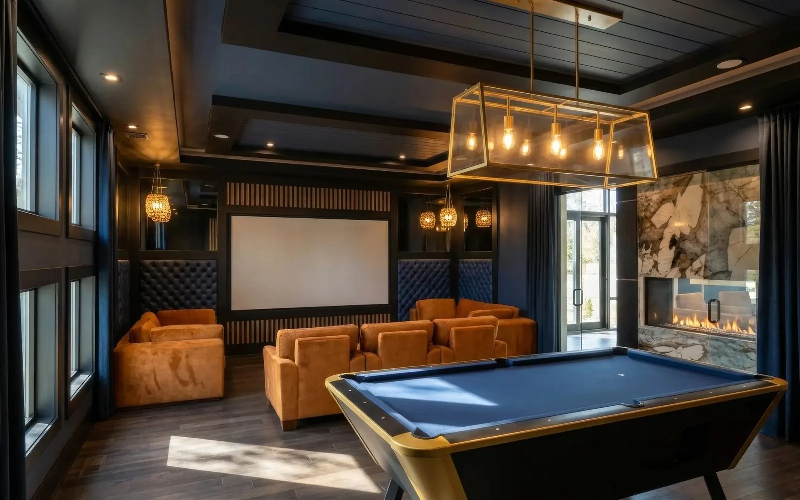 Game room with a pool table and a stone fireplace