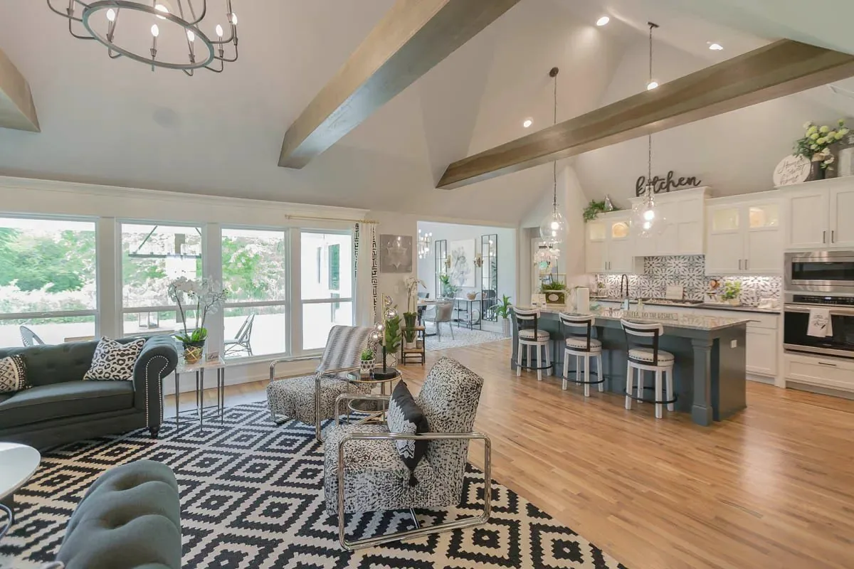 Vaulted great room with exposed beams in a Kingdom Homes house
