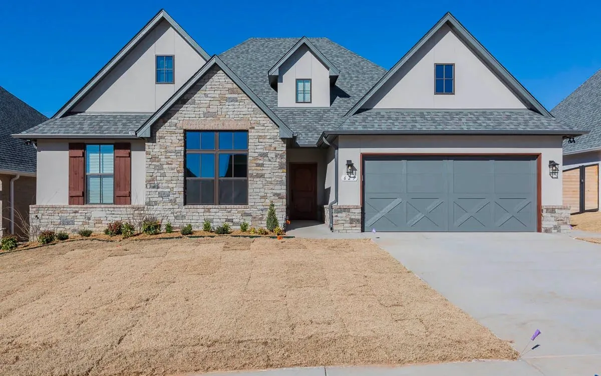 A finished Kingdom Homes house on a newly graded lot